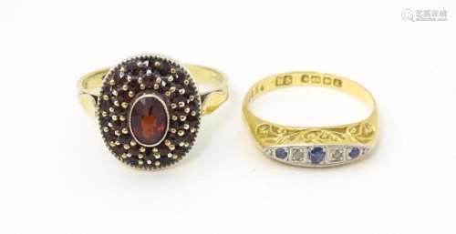 An 18ct gold ring set with diamonds and sapphires together w...