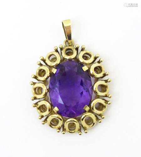 A 9ct gold pendant set with central amethyst. Approx 1 1/2&q...
