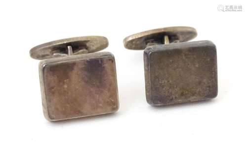 A pair of Danish silver cufflinks designed by Flemming Eskil...