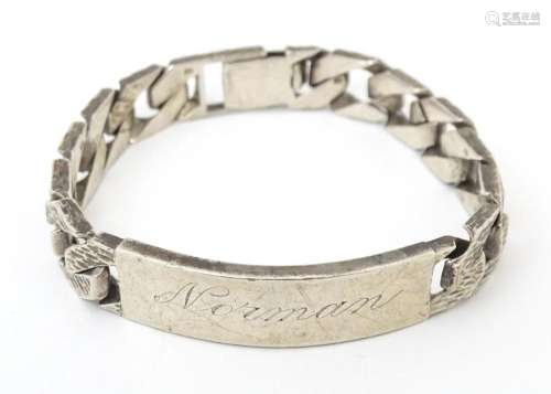 A silver ID bracelet hallmarked London 1979. Approx 7 1/2&qu...