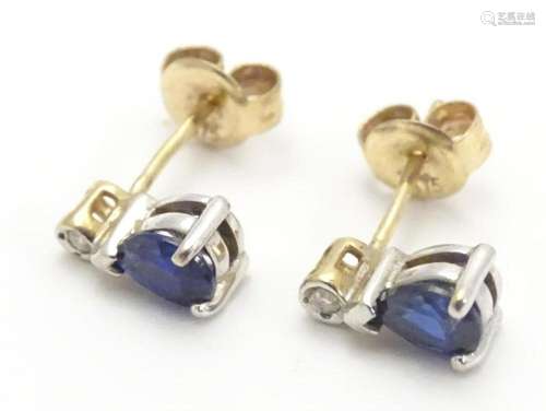 9ct earrings set with topaz and diamonds 3/8" long