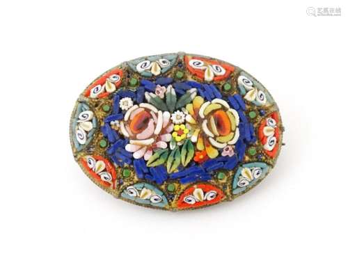 An Italian brooch with micro mosaic detail. Approx 2" w...