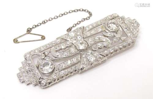 An impressive Art Deco white metal brooch set with a profusi...