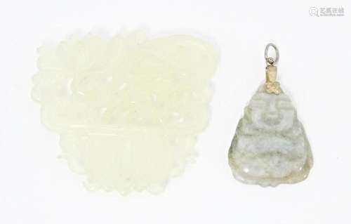 An oriental carved bowenite jade pendant approx 2" long...