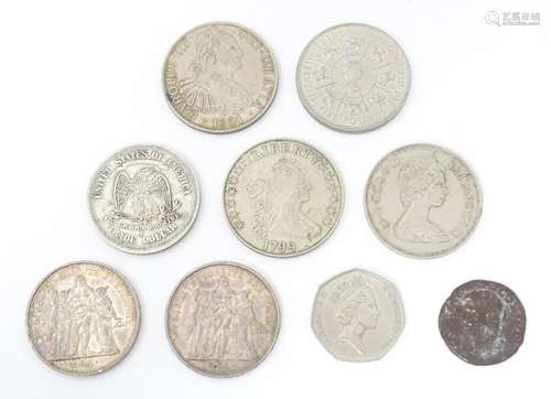 Nine assorted coins / commemorative coins to include an old ...