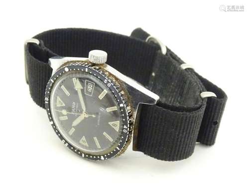 A 1960s steel cased mens divers style watch, the dial signed...