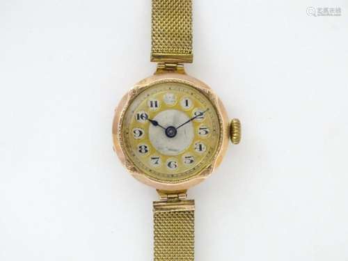 A 9ct gold cased ladies wristwatch with rolled gold watch st...