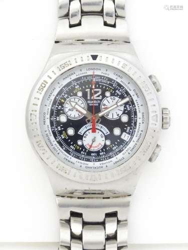 A Swatch Irony chronograph watch with original bracelet. App...