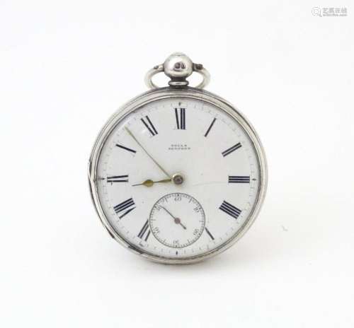 A Victorian silver cased pocket watch, the white enamel dial...