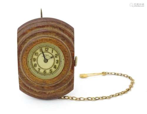 An unusual watch formed as a brooch, the Siro watch with 15 ...