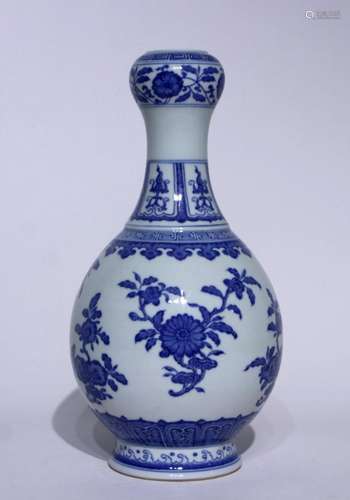 Blue and white floral garlic bottle