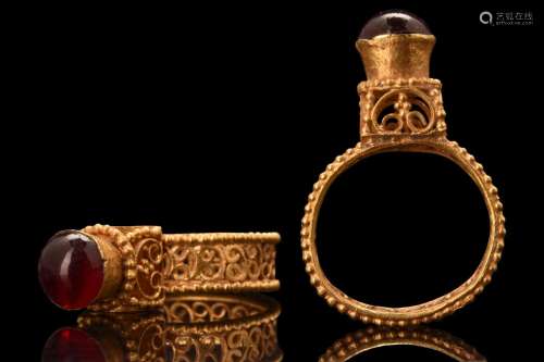 BYZANTINE ARCHITECTURAL GOLD RING WITH GARNET