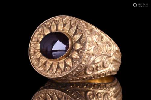 LARGE HELLENISTIC GOLD RING WITH GARNET STONE