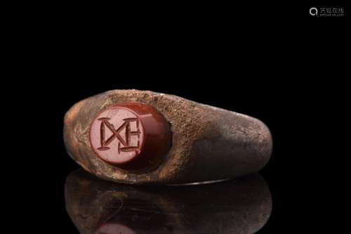 LATE ROMAN SILVER SIGNET RING WITH CARNELIAN MONOGRAM 'IXE' ...