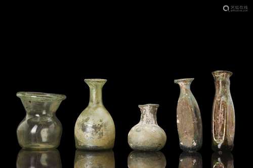 COLLECTION OF FIVE ROMAN GLASS FLASKS