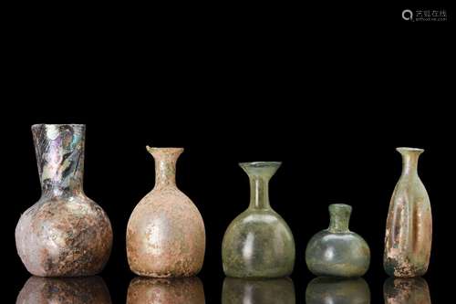 COLLECTION OF FIVE ROMAN GLASS FLASKS