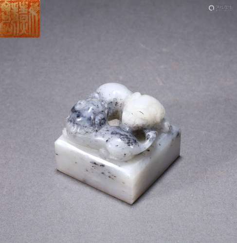 A Carved Jade Feline Seal