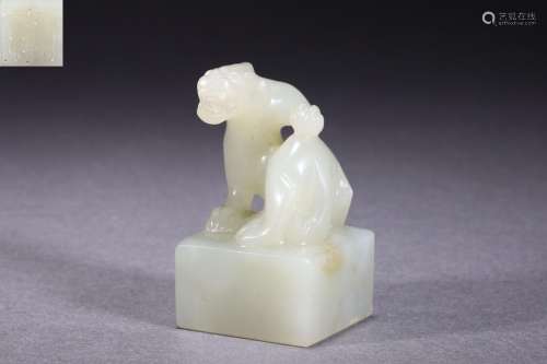 A Carved White Jade Tiger Seal