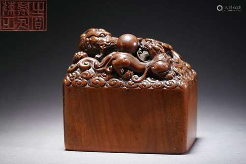 A Carved Wooden Beasts Seal