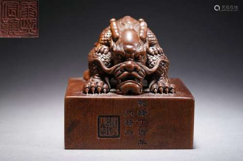 A Carved Wooden Dragon Seal