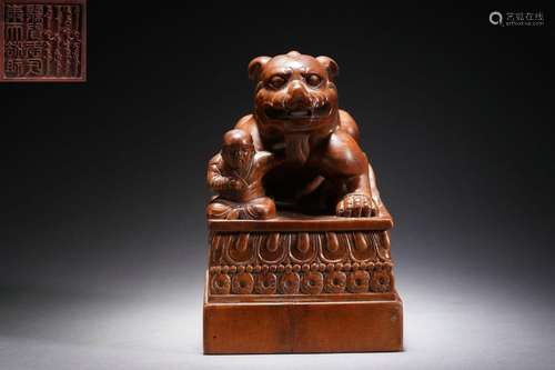 A Carved Wooden Beast Seal