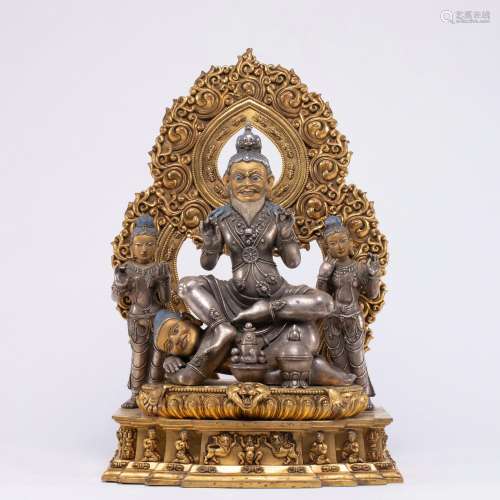 A Gilt bronze inlaid silver Buddha statue