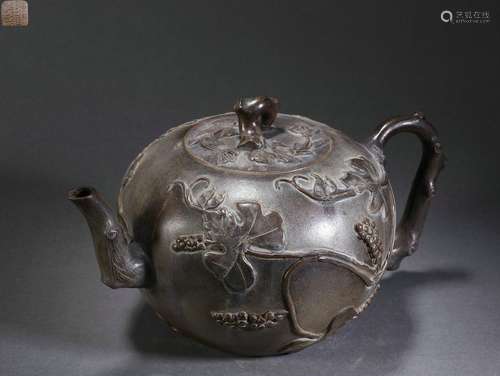 A Squirrel and Grape Pattern Purple Clay Teapot