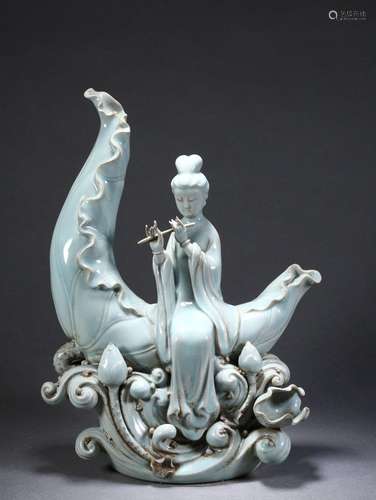 A Celadon Guanyin Statue