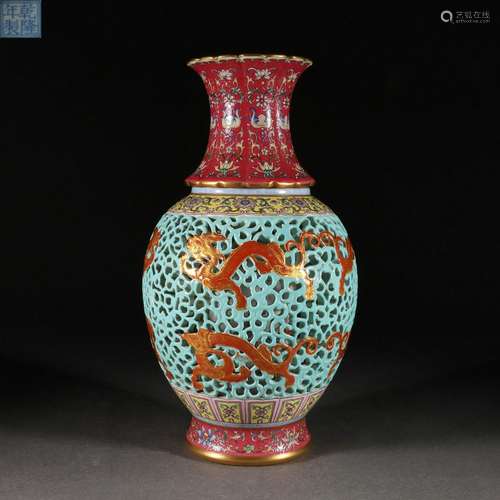 A Famille Rose hollowed out dragon pattern bottle