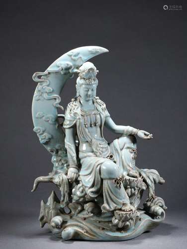 A Celadon Guanyin Statue