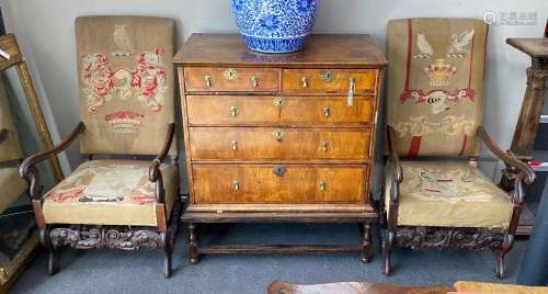 A pair of Carolean style walnut armchairs, width 61cm, depth...