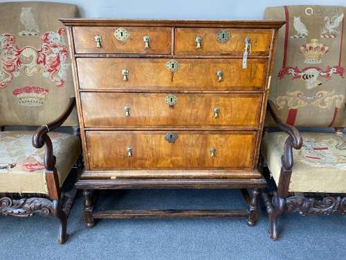 An 18th century feather banded walnut chest on stand, width ...