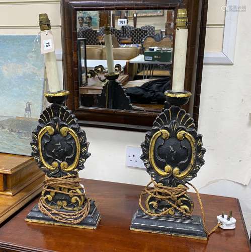 A pair of 18th century style painted parcel gilt table lamps...
