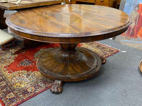 An early Victorian circular rosewood tilt top breakfast tabl...