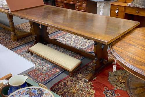 An 18th century style rectangular oak refectory dining table...