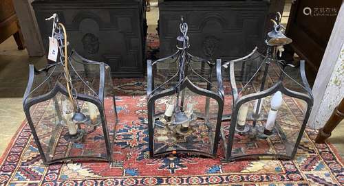 A set of three square glazed metal hall lanterns, height 50c...