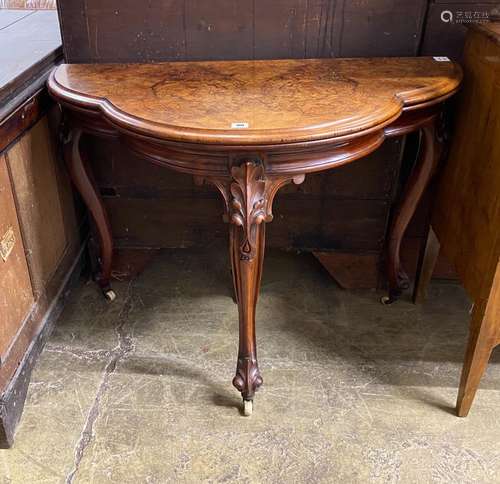 A Victorian figured walnut D shaped folding card table, widt...