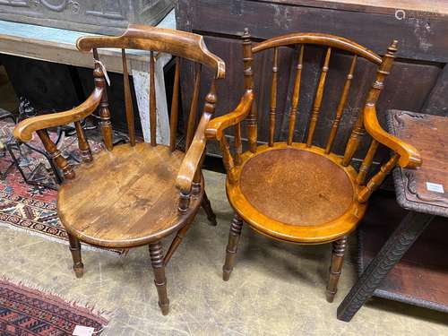 Two early 20th century beech tub framed elbow chairs, larger...