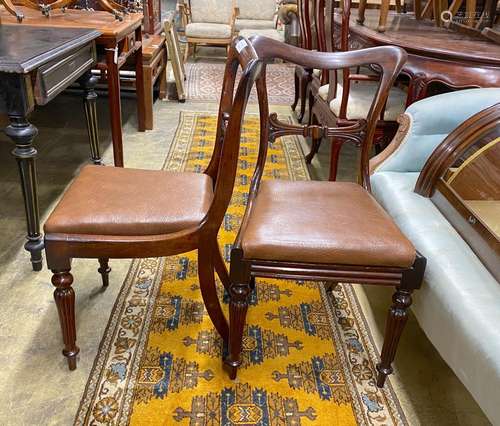 A set of four early Victorian rosewood dining chairs with dr...