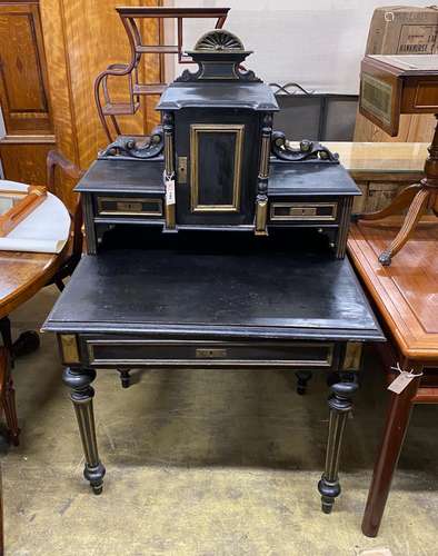 A late 19th century French gilt metal mounted ebonised desk,...