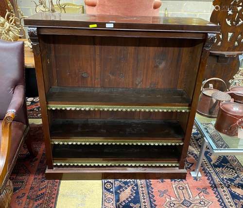 A Victorian mahogany open bookcase with carved acanthus moun...