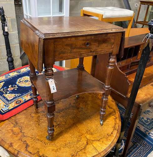 A 19th century French mahogany drop flap two tier work table...