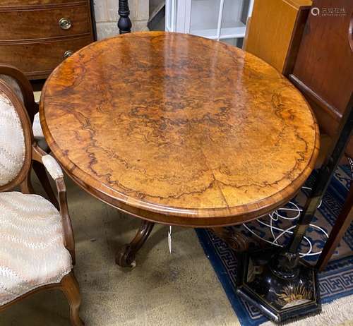 A Victorian oval figured walnut tilt top loo table, length 1...