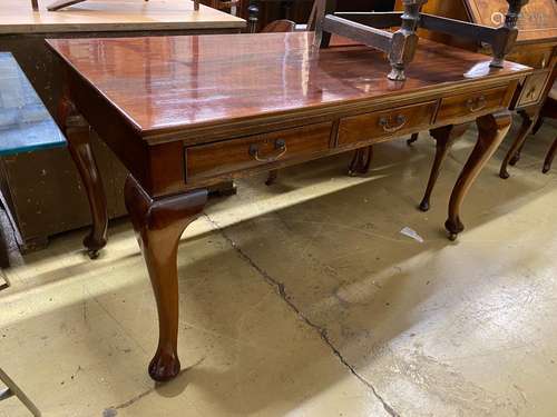 A reproduction Victorian style mahogany three drawer serving...