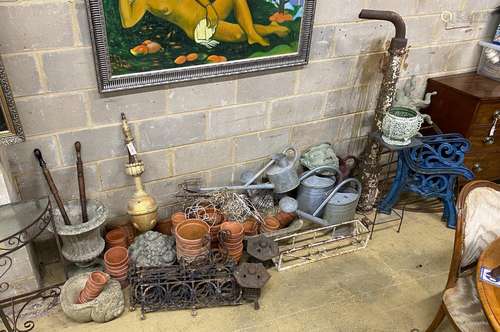 A large quantity of assorted garden ornaments, terracotta po...