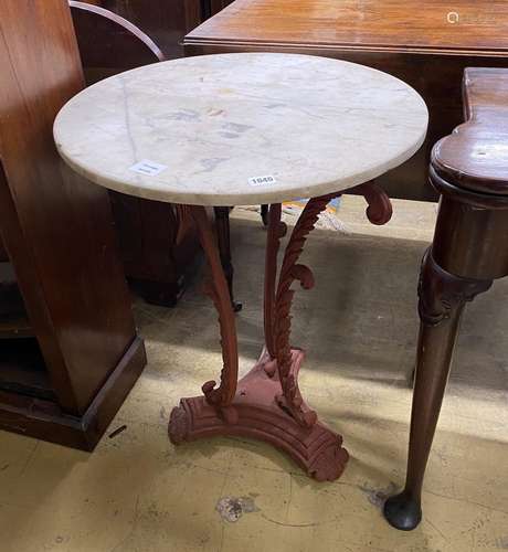 A Victorian style painted cast metal circular top marble top...