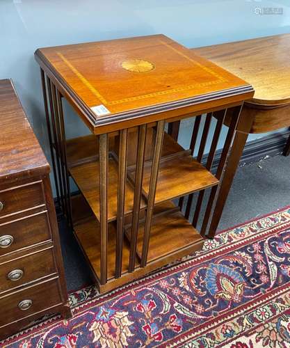 An Edwardian style inlaid mahogany revolving bookcase, width...