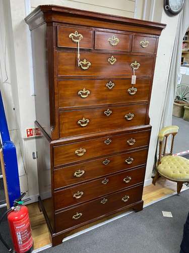 A George III mahogany chest on chest, with later secretaire ...