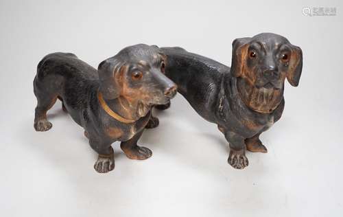 A pair of Austrian cold painted terracotta models of Dachshu...