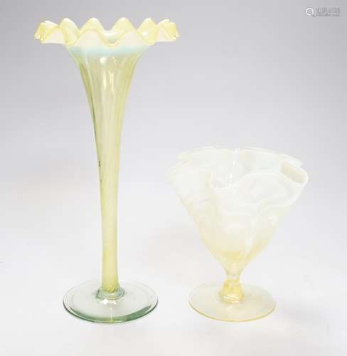 Two early 20th century vaseline glass vases, tallest 29cm